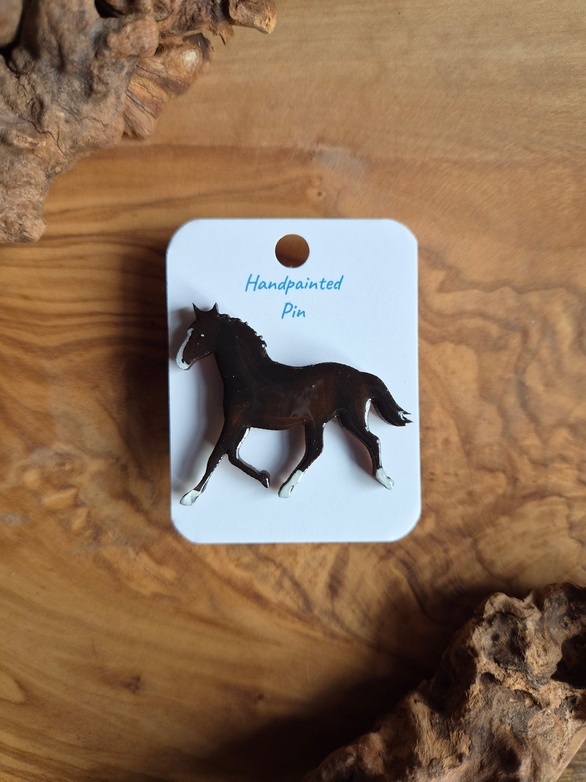 Hand-painted horse shaped wooden pin badge.  Dark bay with white blaze and 3 white socks