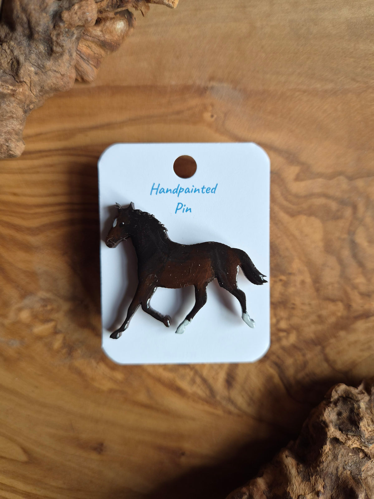 Hand-painted horse shaped wooden pin badge.  Dark bay with white star and 2 white socks
