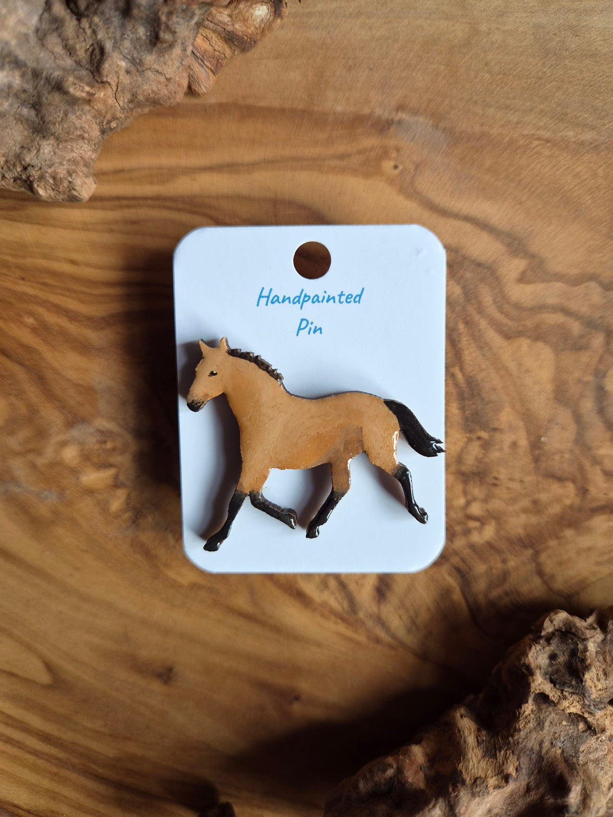 Hand-painted horse shaped wooden pin badge.  Light bay bucksin dun colour