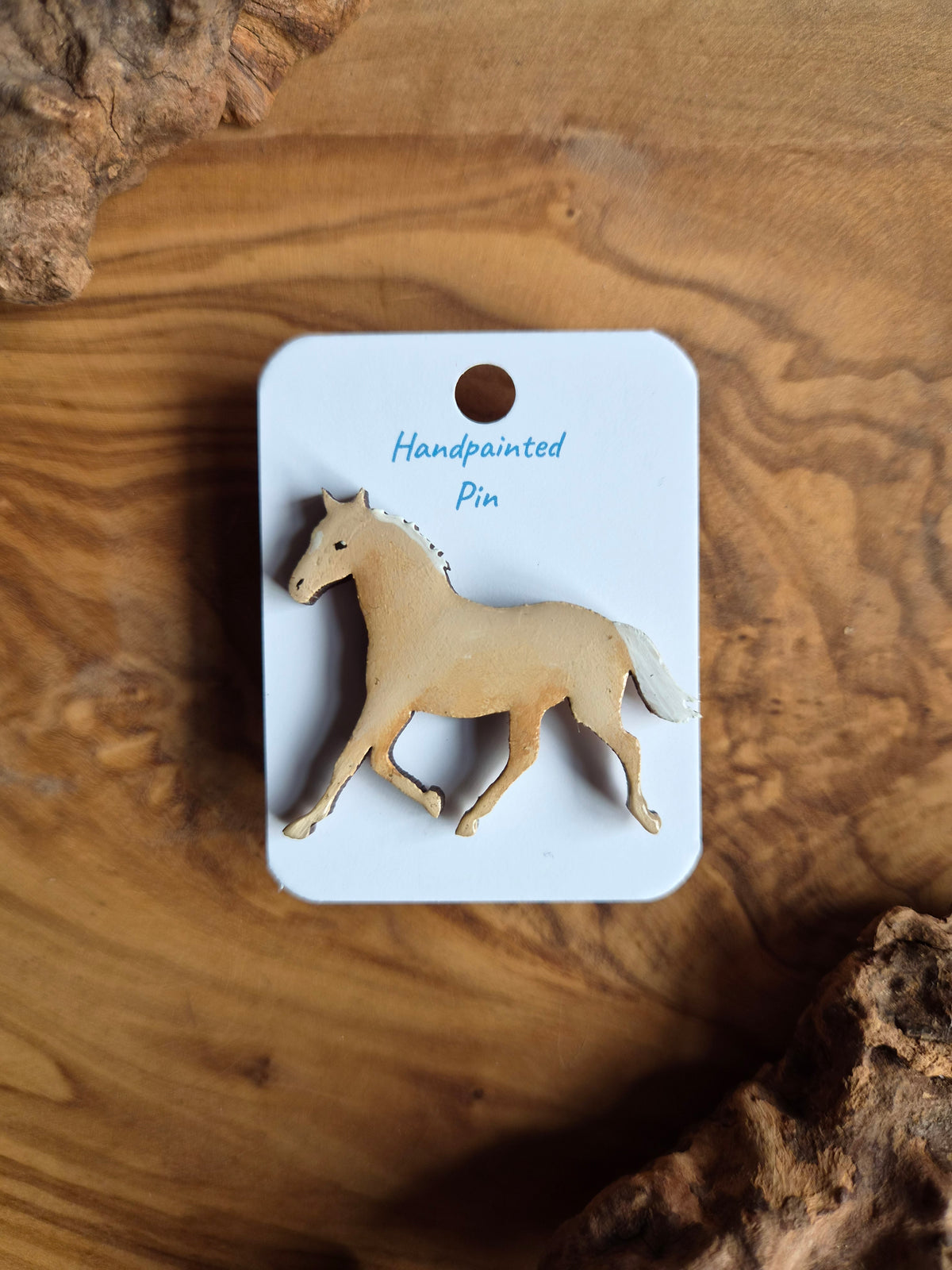 Hand-painted horse shaped wooden pin badge.  light palomino colour
