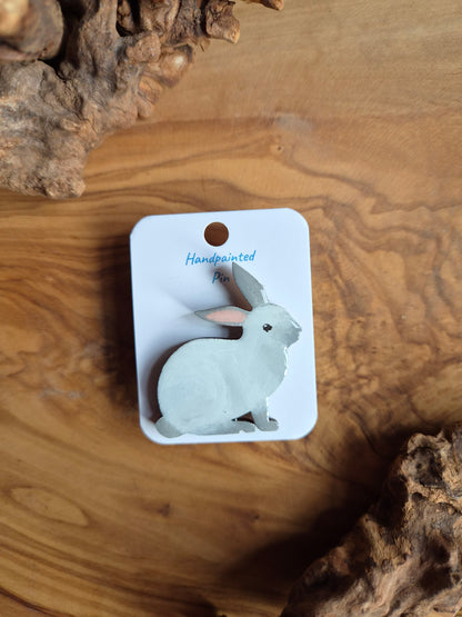 Hand-painted rabbit shaped wooden pin badge.  blue point colour