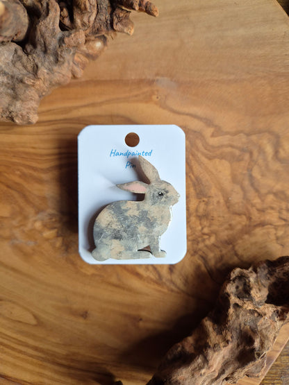 Hand-painted rabbit shaped wooden pin badge.  lilac tortoishell colour